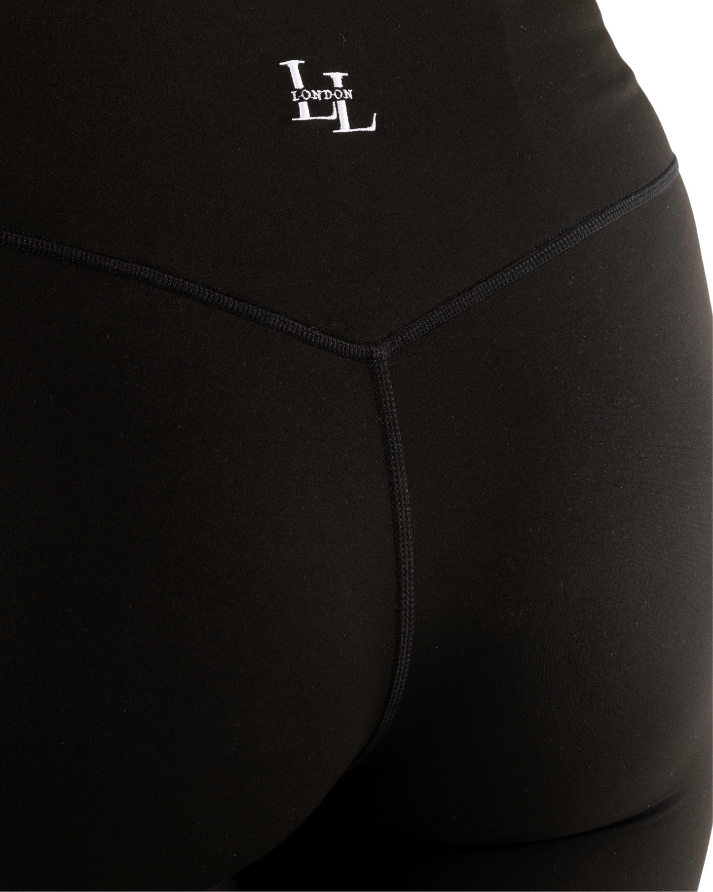 Long legs London logo at the back of black leggings