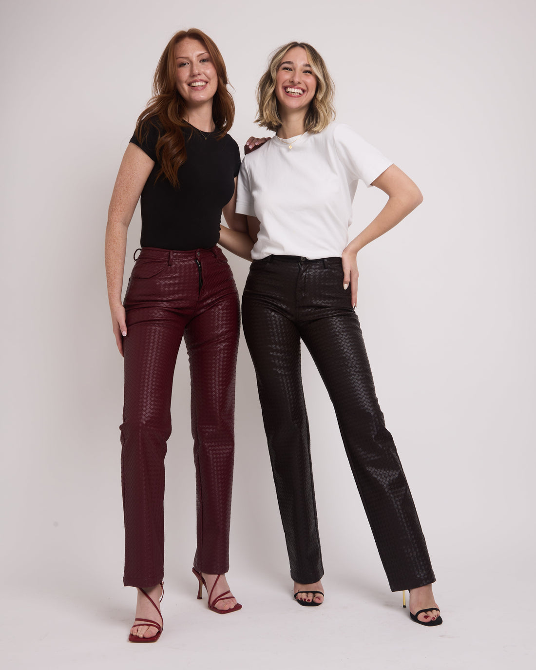 Tall girls wearing leather trousers